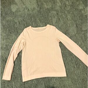 Swiftly Tech Long-Sleeve Shirt 2.0
Hip Length size 8 
Good condition